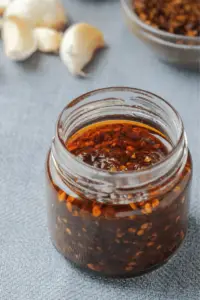 Homemade chili garlic oil with red pepper flakes
