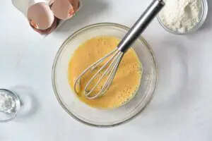 beating eggs for pancakes