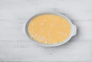 pour egg mixture in casserole dish