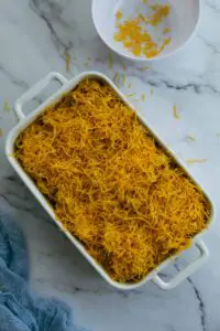 top with shredded cheese